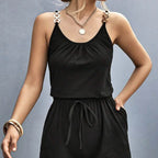 Women’s chain detail suspender jumpsuit from Plush Fashion Hub, casualwear with adjustable straps and a stylish, modern design.