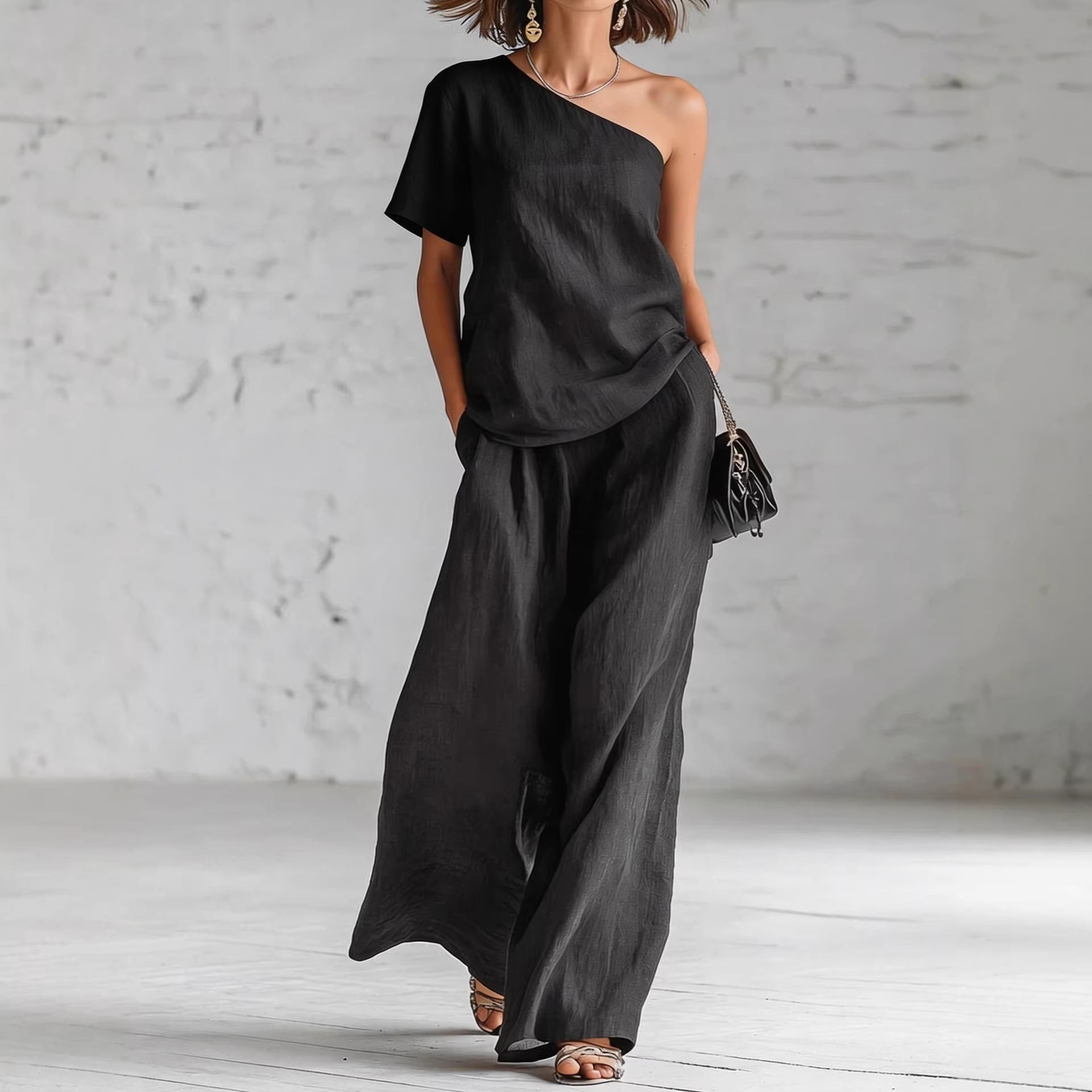 Women's wide-leg pants and top set by FitiqueFit, featuring a casual 3/4 sleeve outfit in a stylish, comfortable design.
