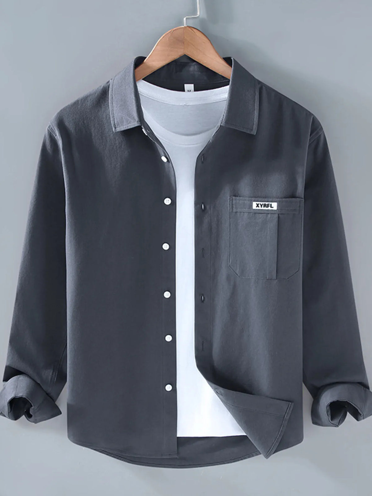Plus size men's button-up long sleeve shirt from Trendsi, featuring a classic collar and tailored fit in a versatile style.