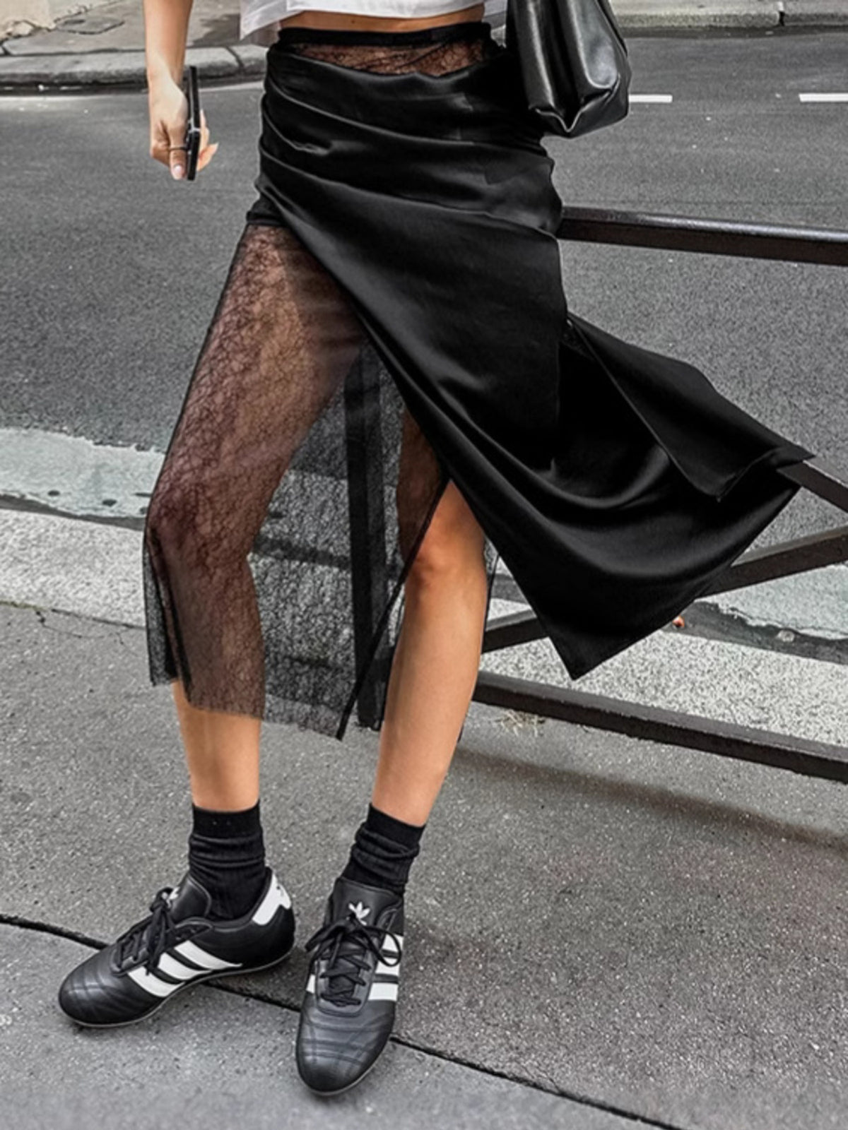 Elegant women’s lace midi skirt with sheer split detail from Plush Fashion Hub, showcasing intricate lace fabric and stylish design.