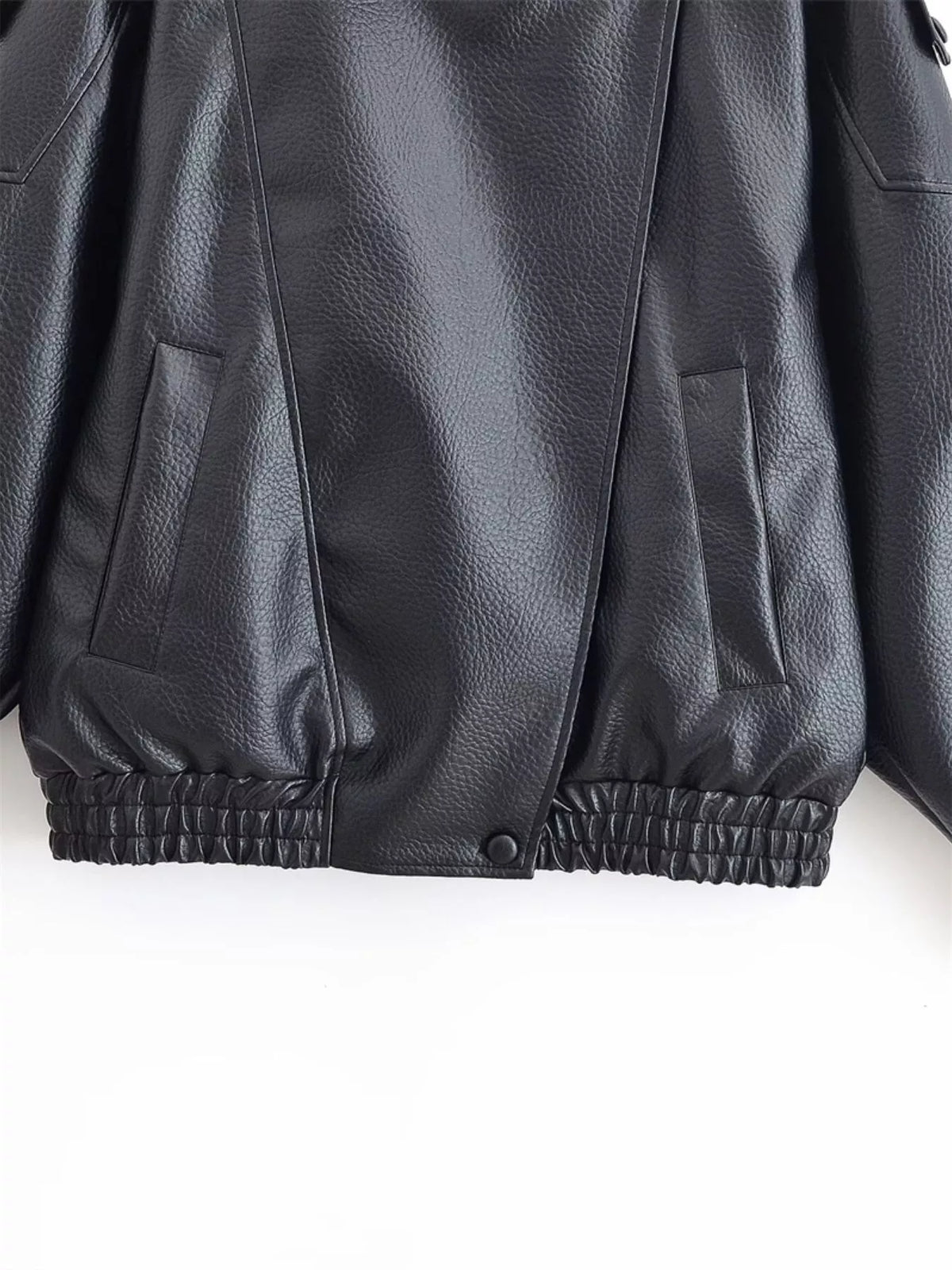 Trendsi asymmetrical faux leather moto jacket for women, stylish black jacket with a modern, edgy design and silver zipper details.