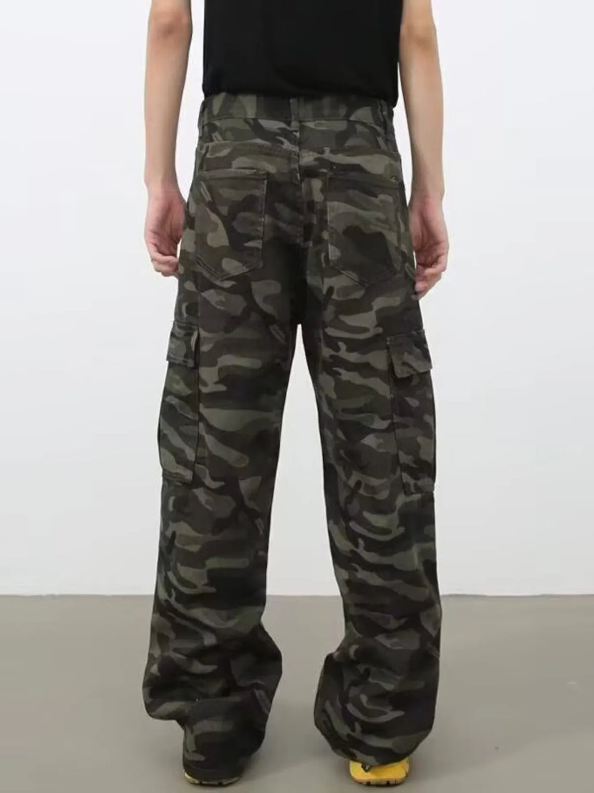Men's full size camo print wide leg cargo jeans by Plush Fashion Hub, showcasing the camouflage pattern and relaxed fit.
