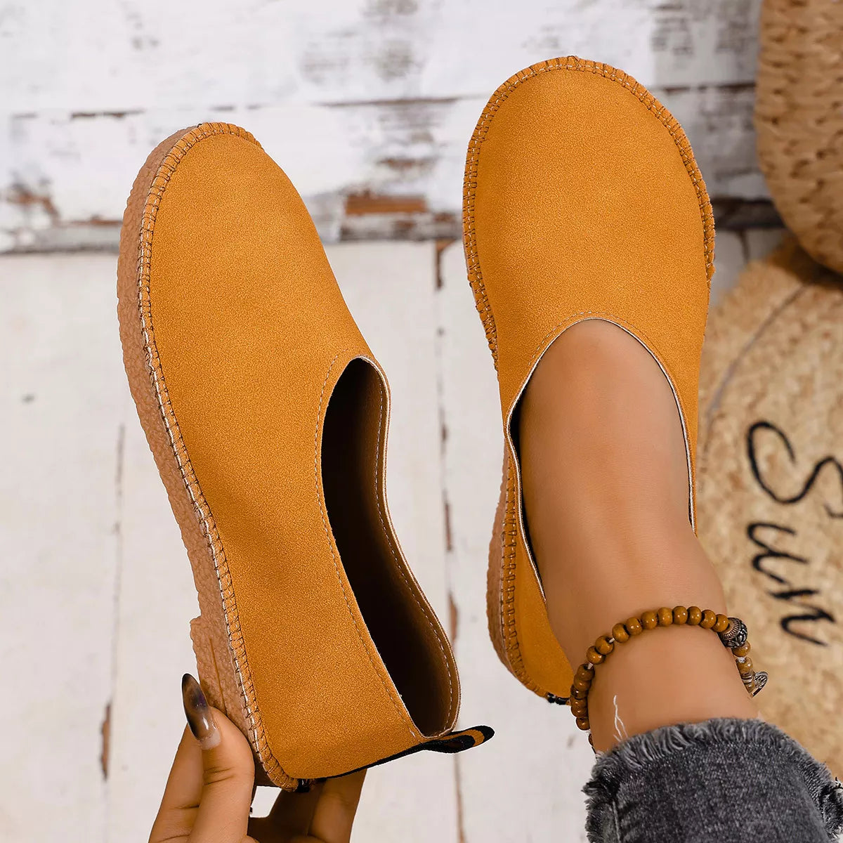 Round toe slip-on flats by Plush Fashion Hub, featuring a sleek design and comfortable fit, perfect for casual or dressy occasions.