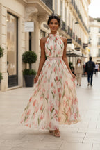 Women's floral and solid print halterneck high-waist swing dress by FitiqueFit, shown in a casualwear style with flowing fabric.