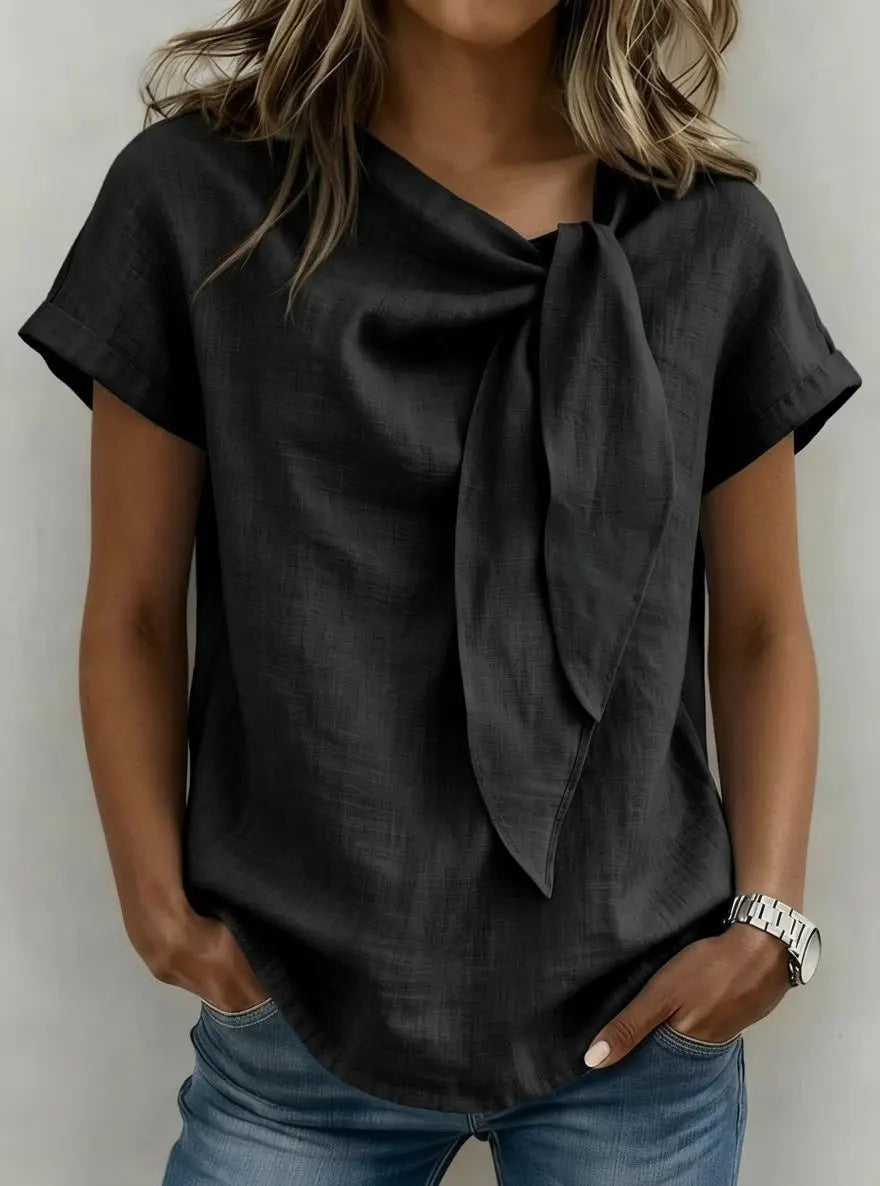 Women's loose-fit short sleeve casual pullover T-shirt by FitiqueFit, shown in a relaxed fit with a round neckline.