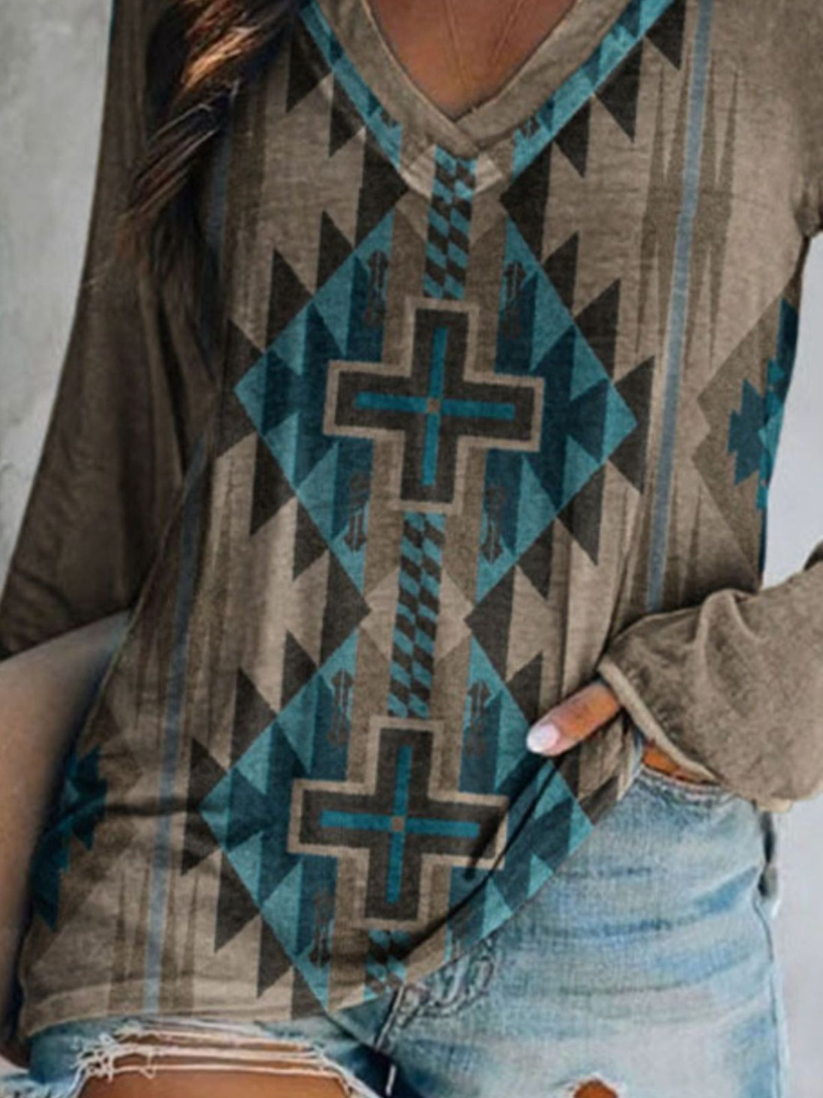 Plus size Plush Fashion Hub geometric print V-neck long sleeve casual T-shirt with modern design and comfortable fit.