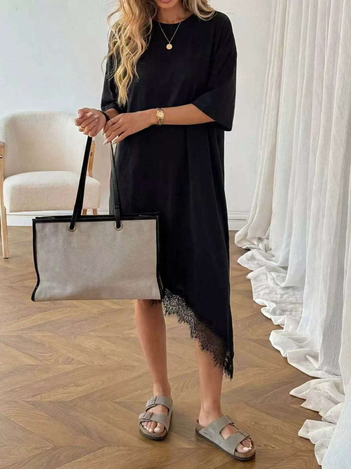 Lace trim asymmetrical hem T-shirt dress by Plush Fashion Hub, featuring a casual shirt dress with stylish lace detail and an uneven hem.