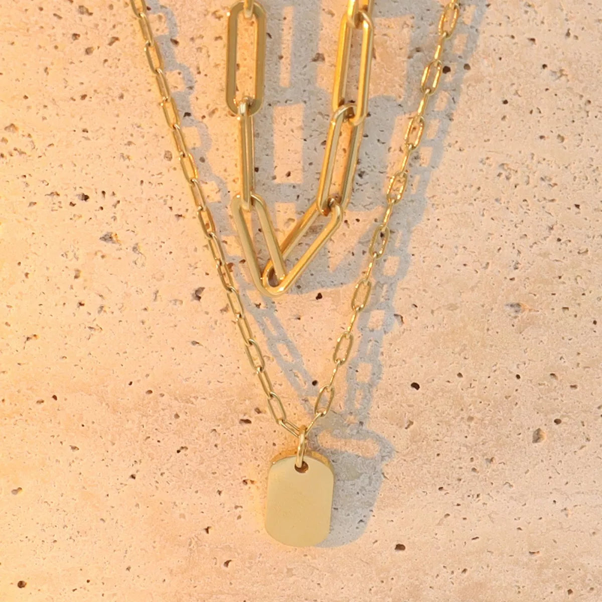 18K gold-plated double layered necklace with delicate chain links and layered design, showcasing elegant jewelry from Plush Fashion Hub.
