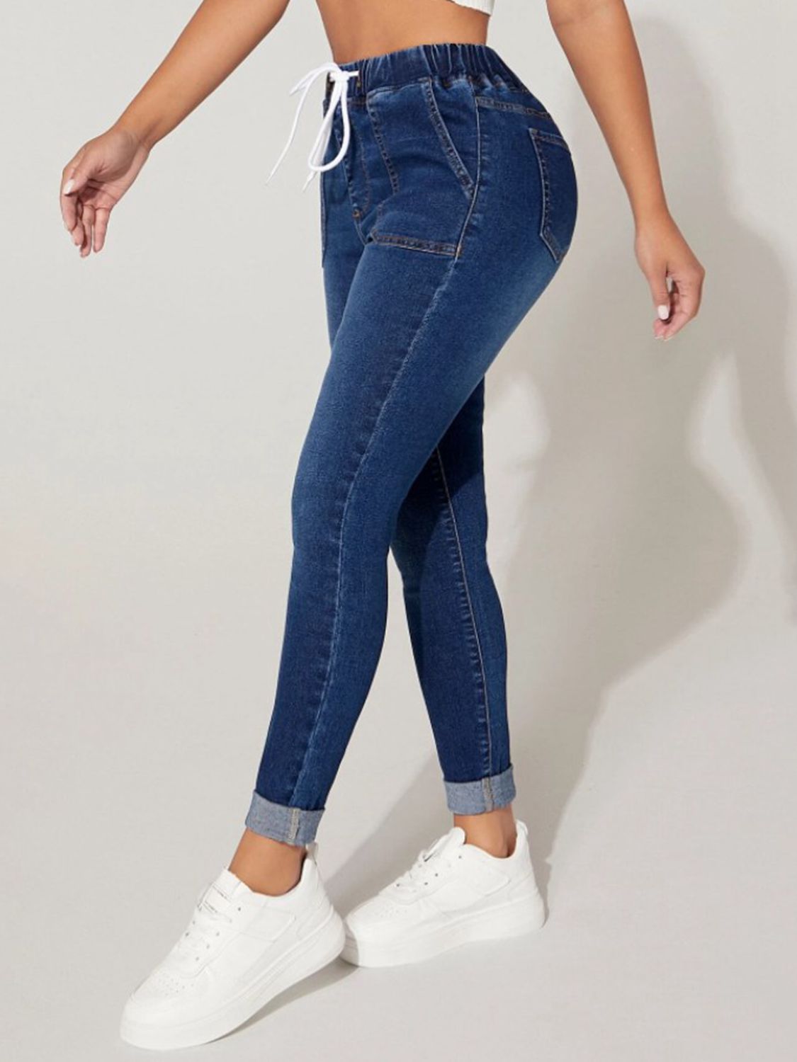 Plush Fashion Hub plush fashion drawstring cropped denim jeans with a relaxed fit and classic blue wash.