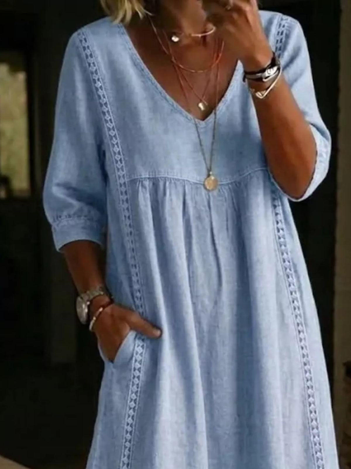 Plus size full-length midi dress with V-neck and 3/4 sleeves by Trendsi, featuring a stylish and comfortable design.