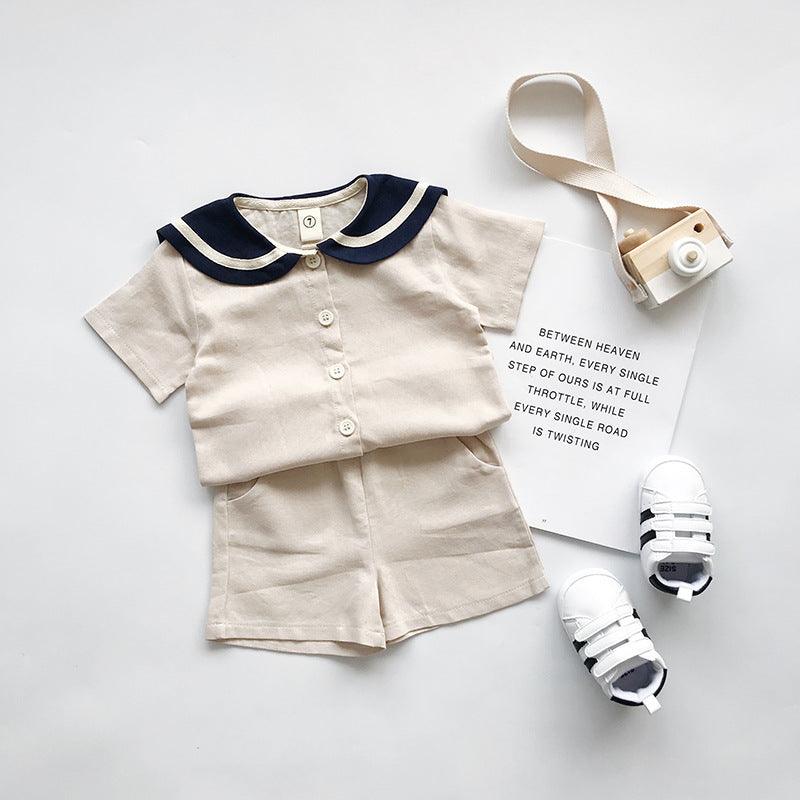 Boys and girls Navy solid short sleeves setsGear up for summer with our boys and girls Navy solid short-sleeved sets! Made with 90% cotton, these two-piece pants suits are perfect for both boys and girls. Say Infant setsPlush Fashions ShopPlush Fashion Shop