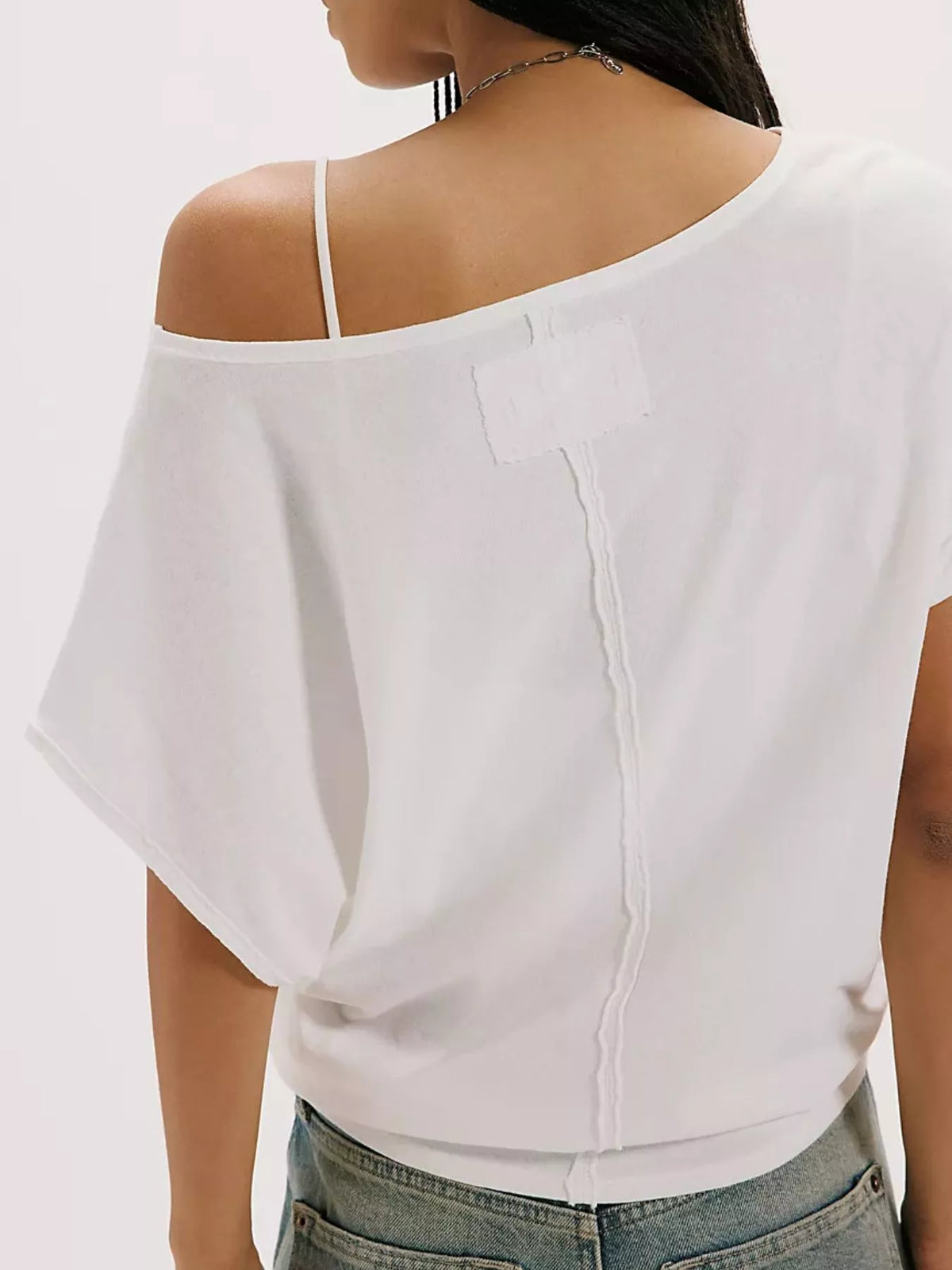 Solid color one-shoulder t-shirt from Plush Fashion Hub, featuring a stylish asymmetrical design and comfortable fit.