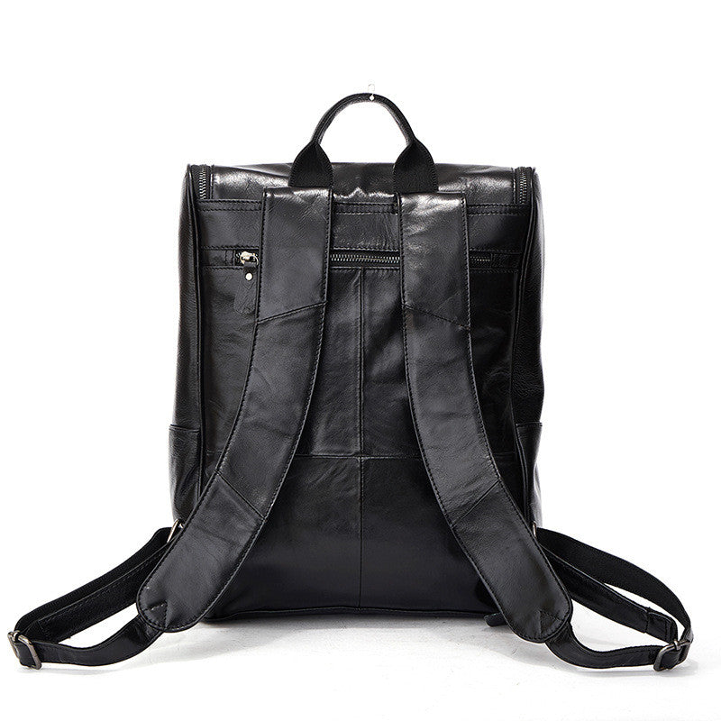 Black leather computer backpack with first layer leather construction from Pi-Mart, featuring multiple compartments and padded shoulder straps.