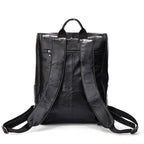 Black leather computer backpack with first layer leather construction from Pi-Mart, featuring multiple compartments and padded shoulder straps.