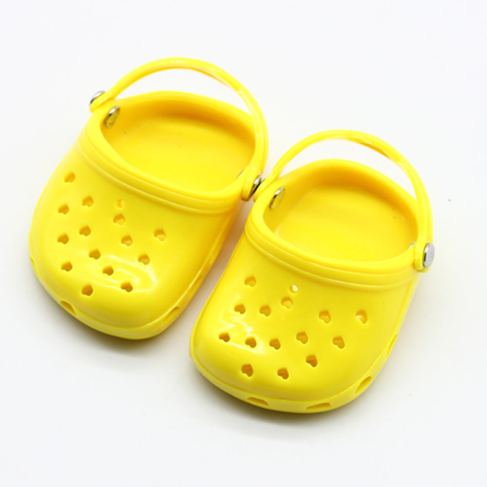 Children doll beach slippersExperience beach fun with these colorful doll beach slippers! Made of durable plastic, these fashionable accessories are perfect for all ages - from infants to youthGirls doll shoesPlush Fashions ShopPlush Fashion Shop