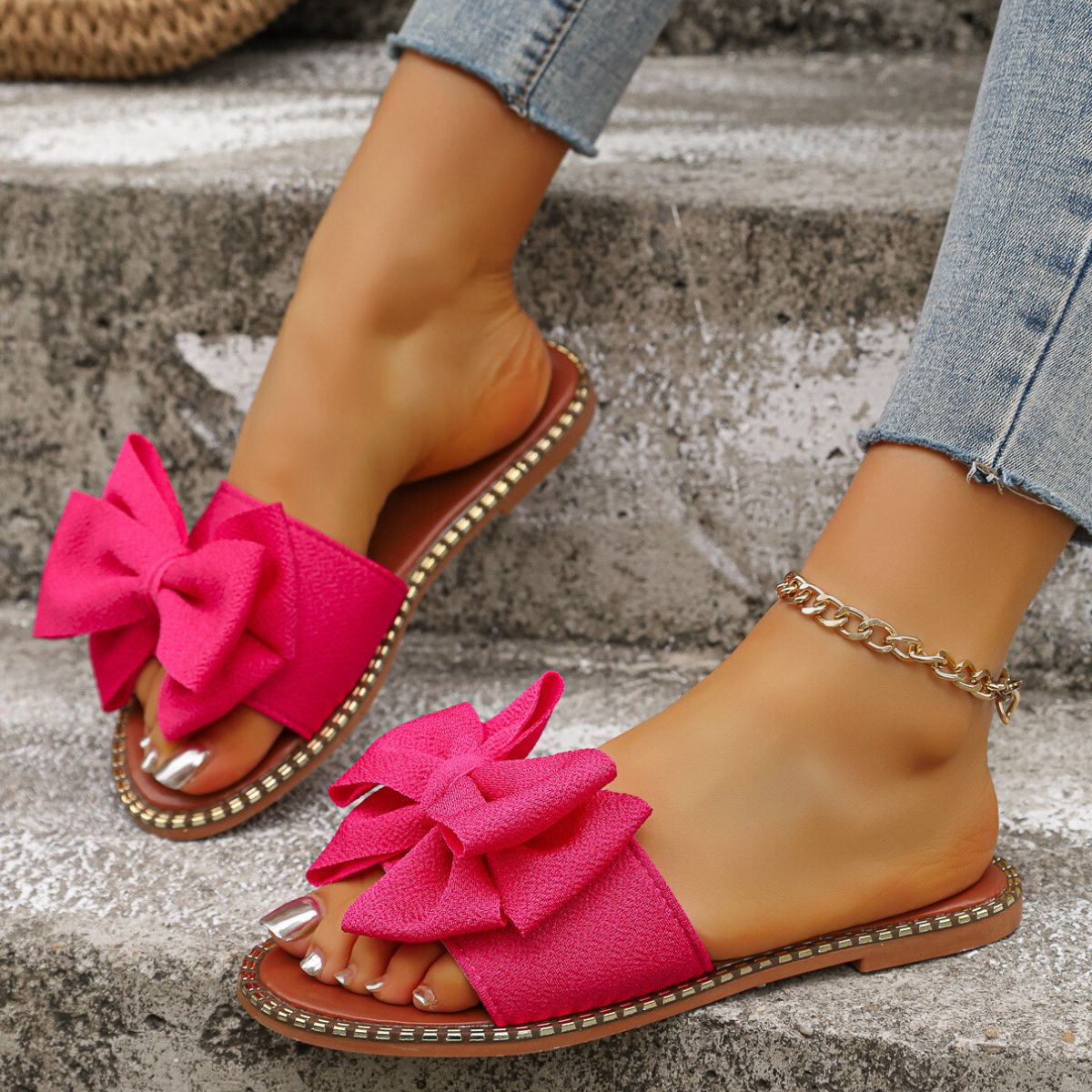 Plush Fashion Hub bowknot embellished flat sandals with stylish design and open toe, perfect for casual summer wear.