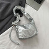 PU leather drawstring shoulder bag in silver finish, stylish and durable, 7x4x6 inches.