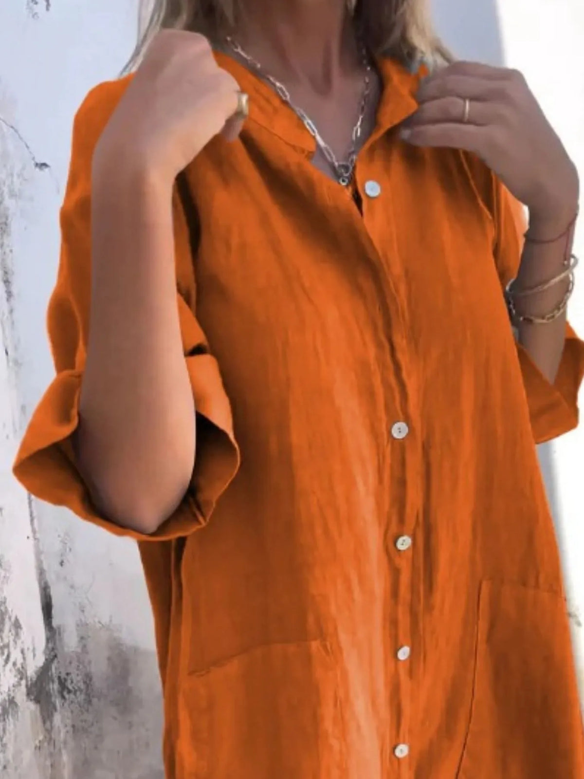 Plus size casual linen button-down shirt dress by Trendsi, shown in full length with long sleeves and a relaxed fit.