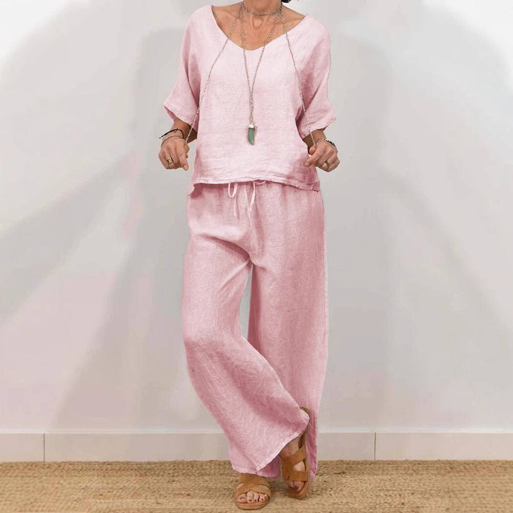 Women's multi-color two-piece casualwear set with V-neck top and matching pants by Plush Fashion Hub.