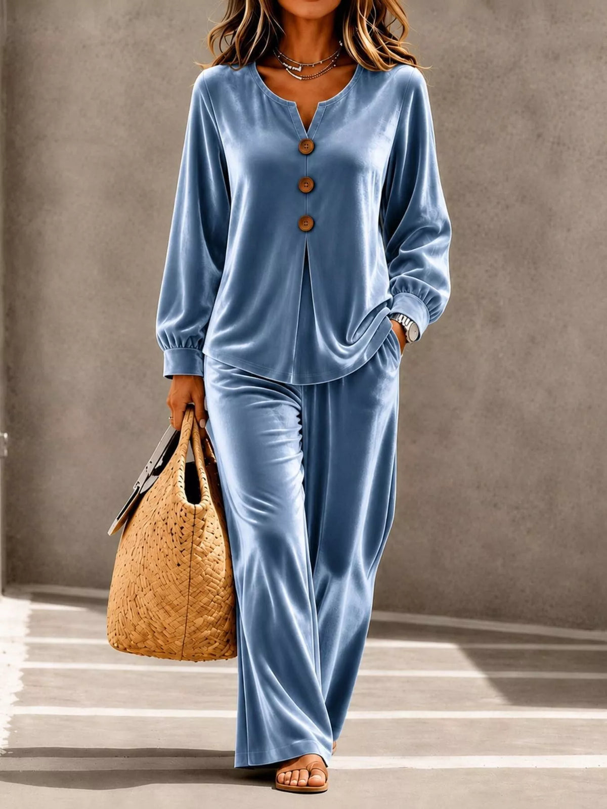 Elegant velvet button top and pants set by Trendsi, featuring a stylish and comfortable matching ensemble for sophisticated looks.