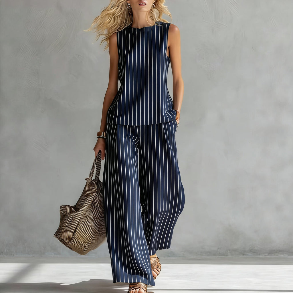 Women's sleeveless printed tank top and wide-leg pants two-piece casualwear set by Plush Fashion Hub, shown flat with vibrant pattern.