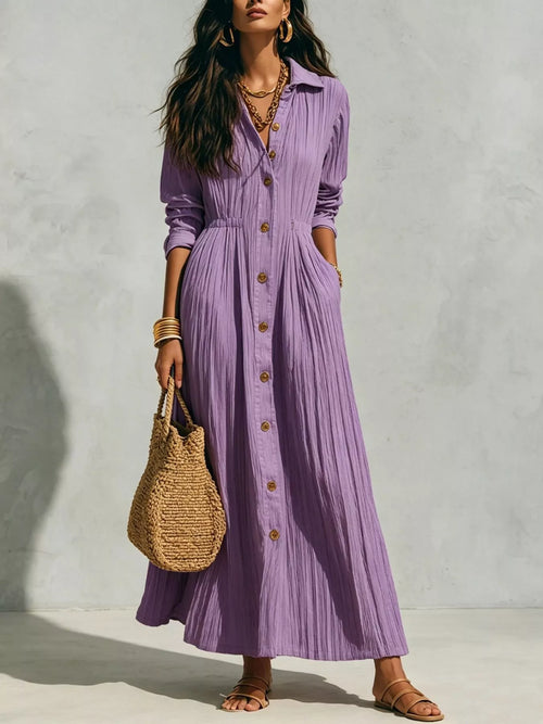 Plus size textured button-front long sleeve maxi dress from Trendsi, showcasing the full length with a relaxed fit and stylish design.