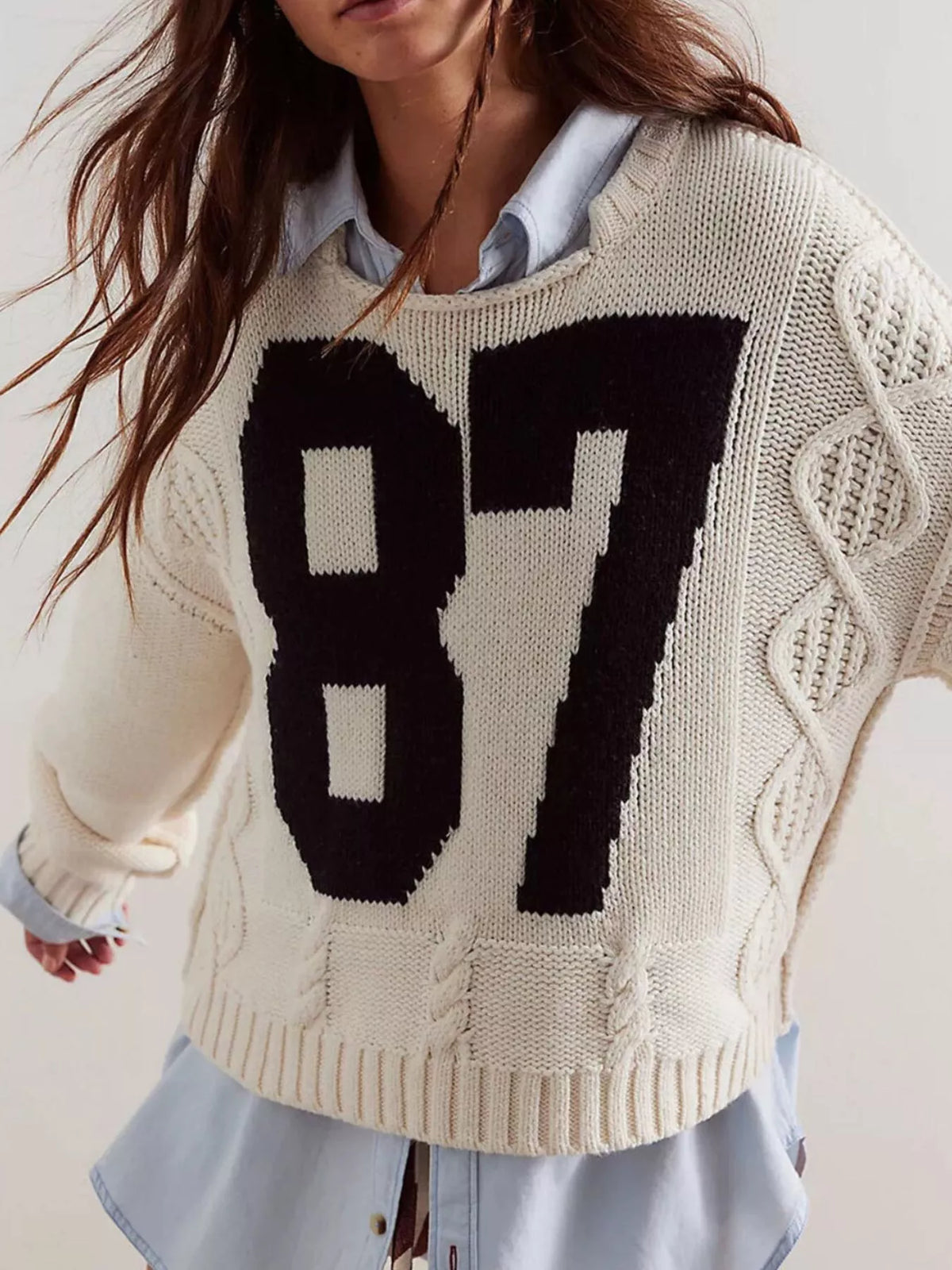 Cable-knit sweater with 78 numbers, trendy tops by Trendsi, featuring a cozy knit design perfect for casual wear.