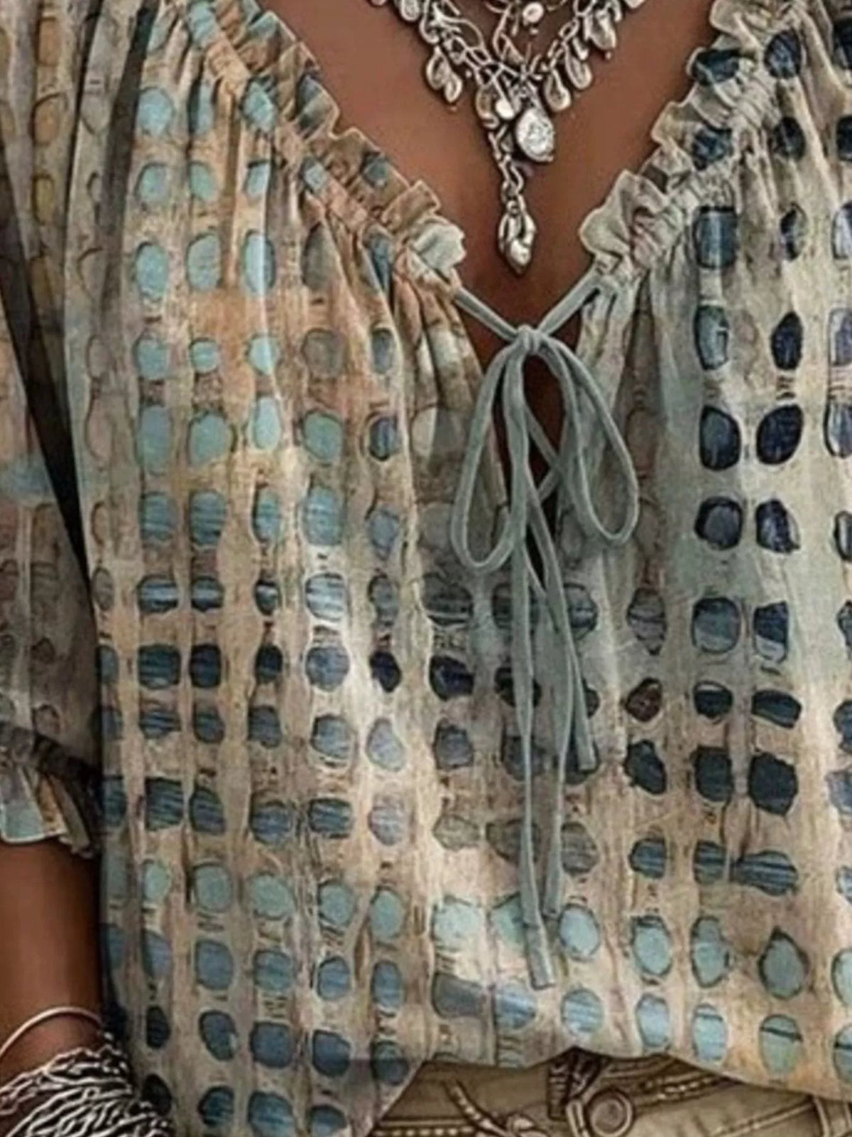 Plus size Trendsi blouse with tie neck and 3/4 sleeves, shown in a full-size fit, featuring a stylish and comfortable design.