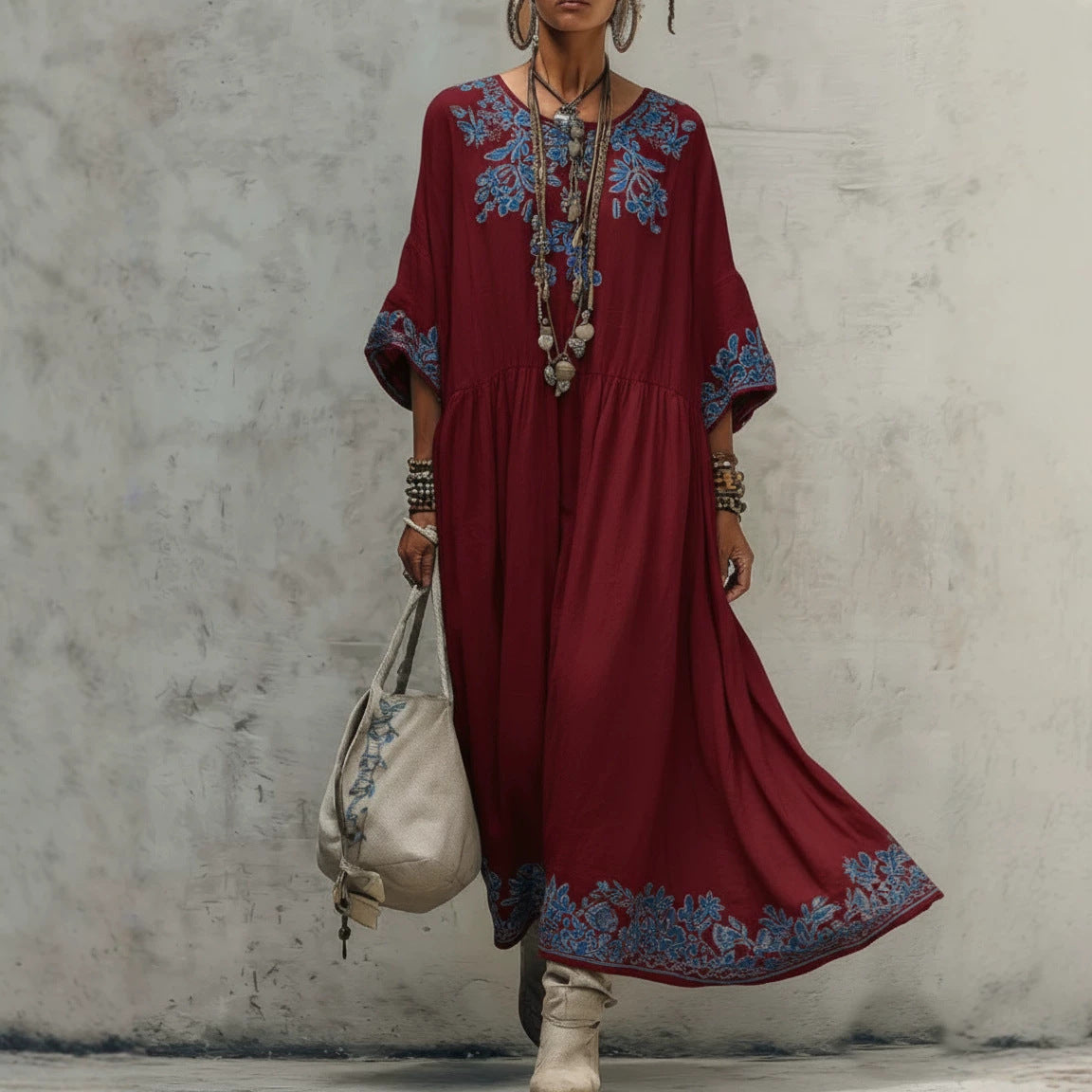 Women's printed batwing sleeve midi dress in loose fit linen blend fabric by Plush Fashion Hub, featuring a relaxed, stylish design.