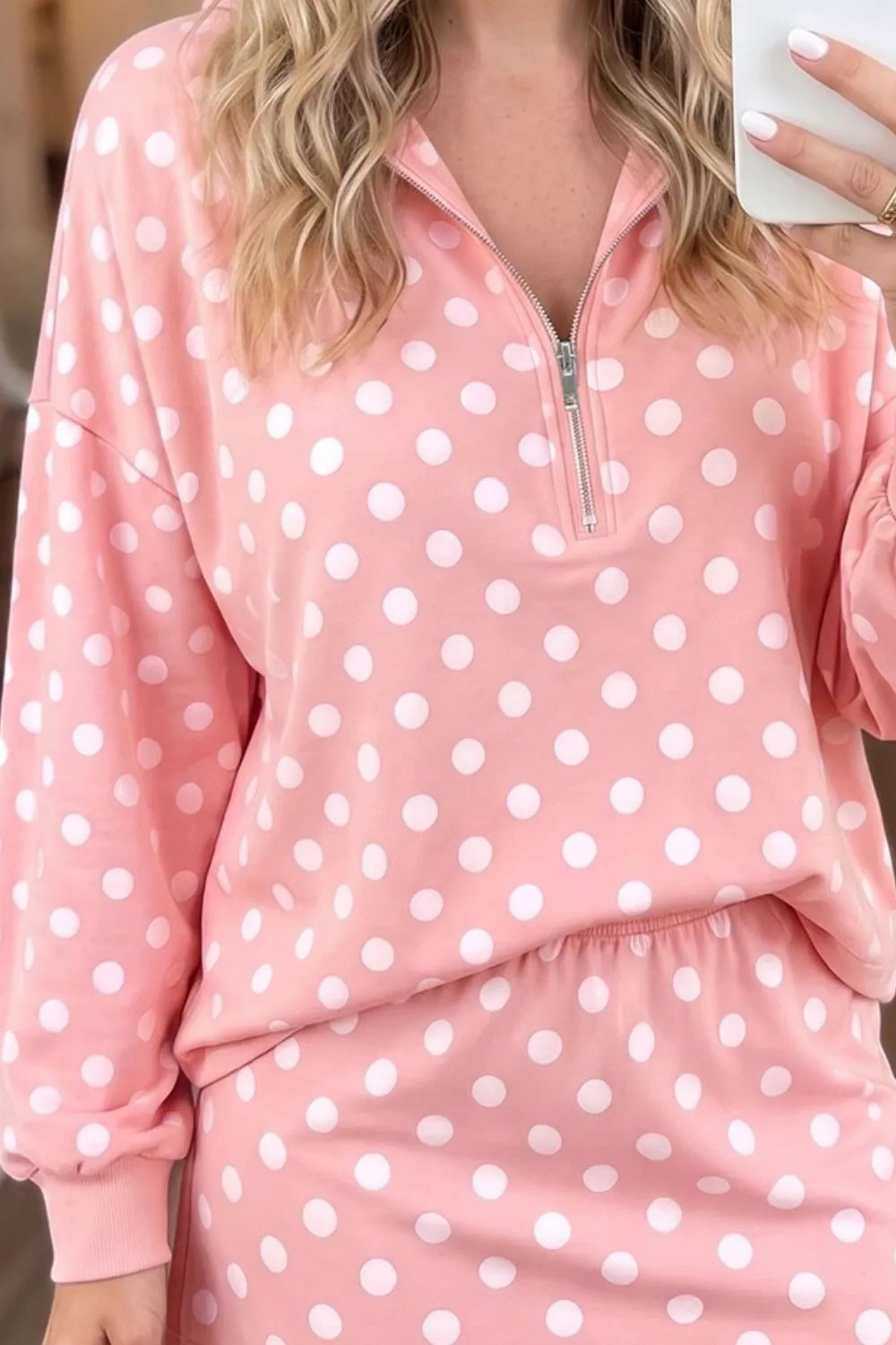 Polka dot quarter zip sweatshirt and shorts set for women by Trendsi, featuring a casual, comfortable matching lounge outfit.