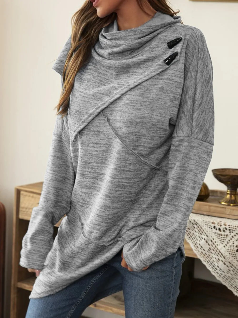 Long sleeve cowl neck t-shirt with asymmetrical hem from Plush Fashion Hub, featuring a stylish, draped neckline and modern design.