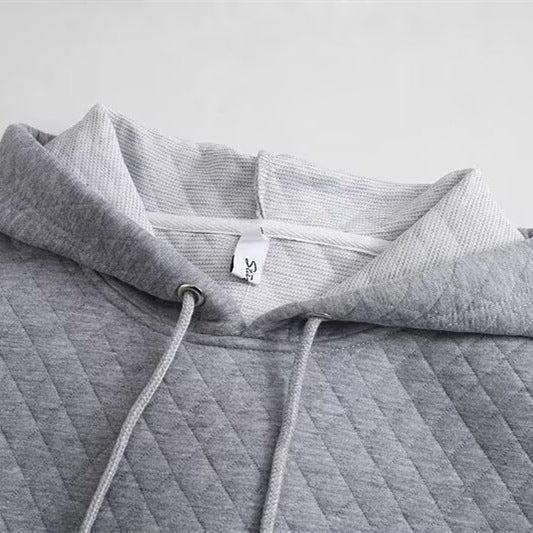 Women’s diamond grid casual hoodie by Plush Fashion Hub featuring a loose fit and cozy design, shown in the image.