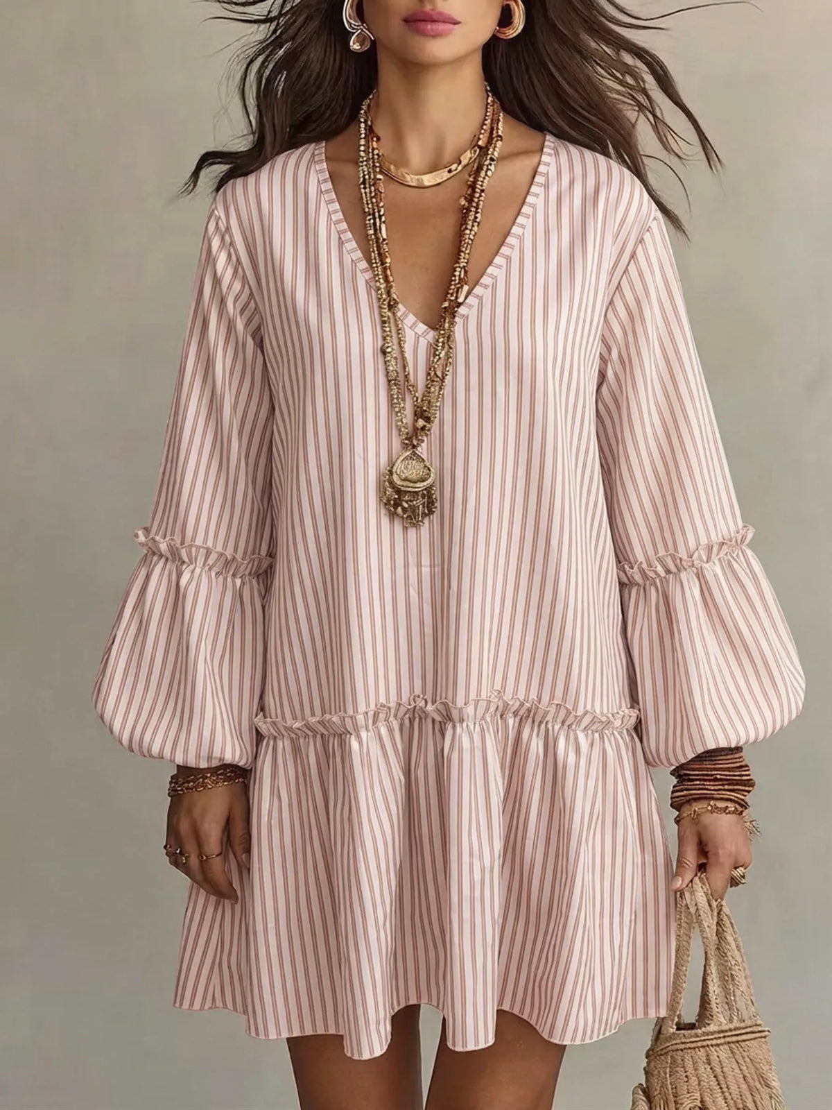 Plus size striped balloon sleeve mini dress by Trendsi, featuring a stylish full-coverage fit and vibrant striped design.
