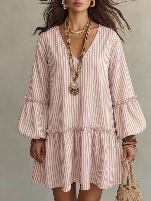 Full size striped balloon sleeve mini dress from Trendsi, featuring bold stripes and a stylish, fitted silhouette.