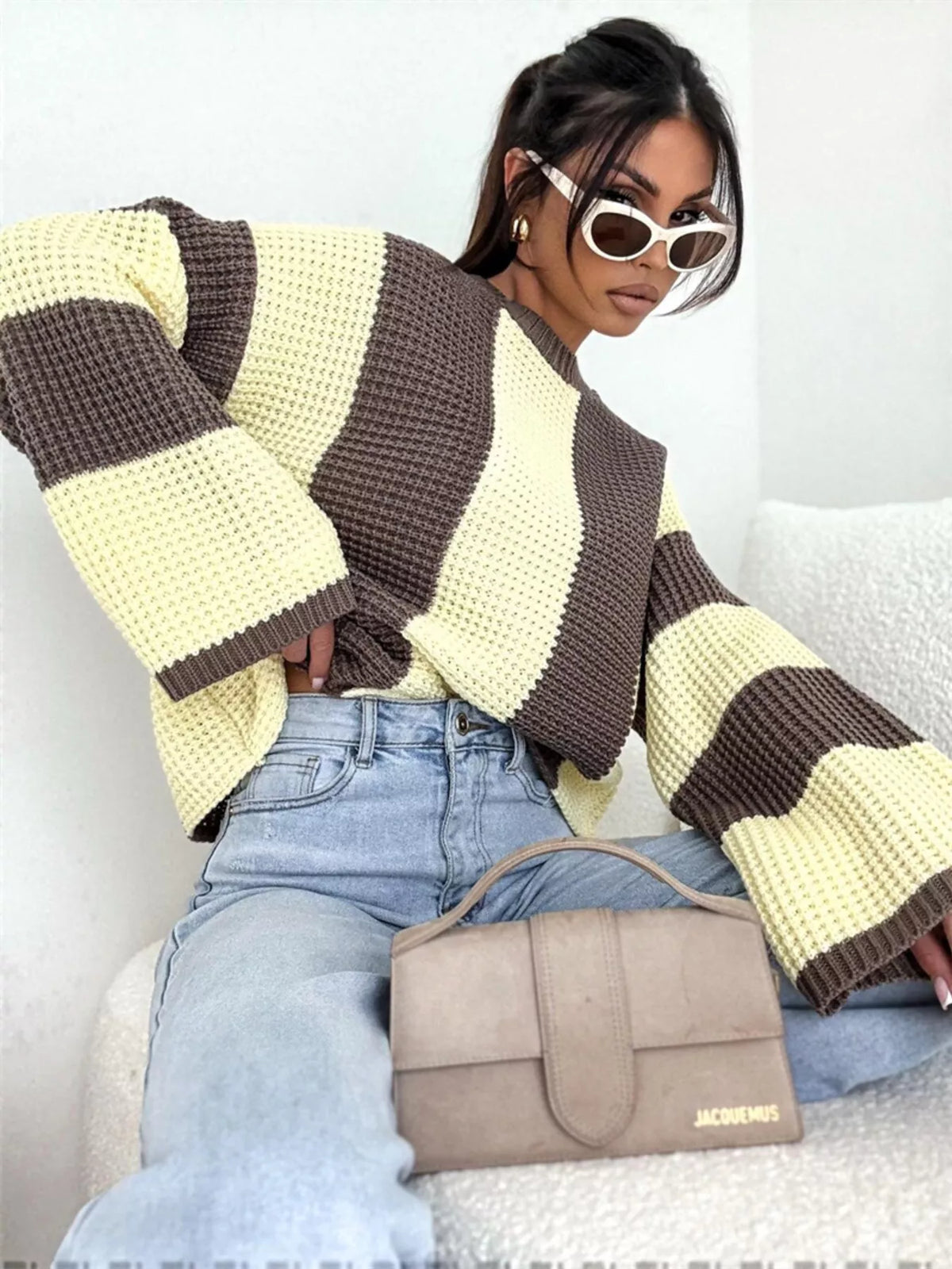 Color block long sleeve sweater from Trendsi featuring vibrant blue, black, and white color panels, soft knit fabric, and a cozy fit.