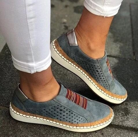 Large size casual women's canvas loafers with a classic design, featuring a comfortable slip-on style and neutral color.