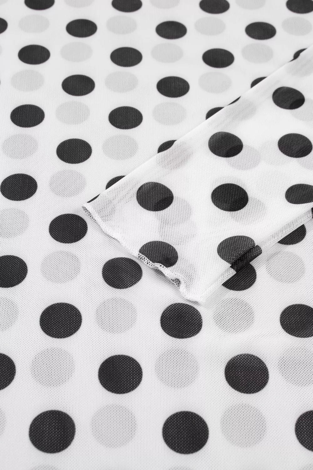 Polka dot mesh long sleeve sheath top with stand neck from Plush Fashion Hub, stylish and lightweight with a modern design.