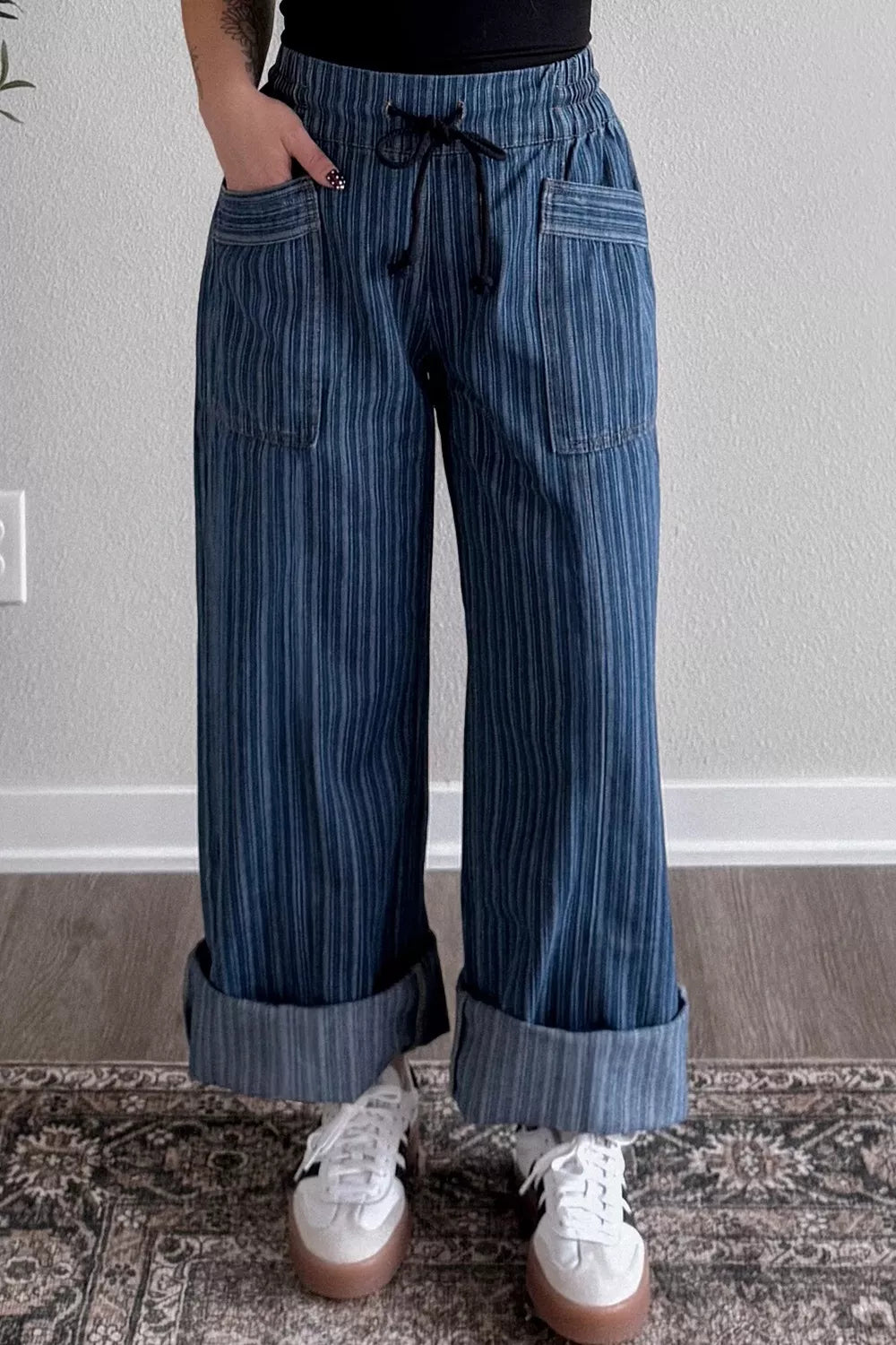 Striped wide-leg denim jeans from Plush Fashion Hub featuring a relaxed fit and classic blue and white stripe pattern.