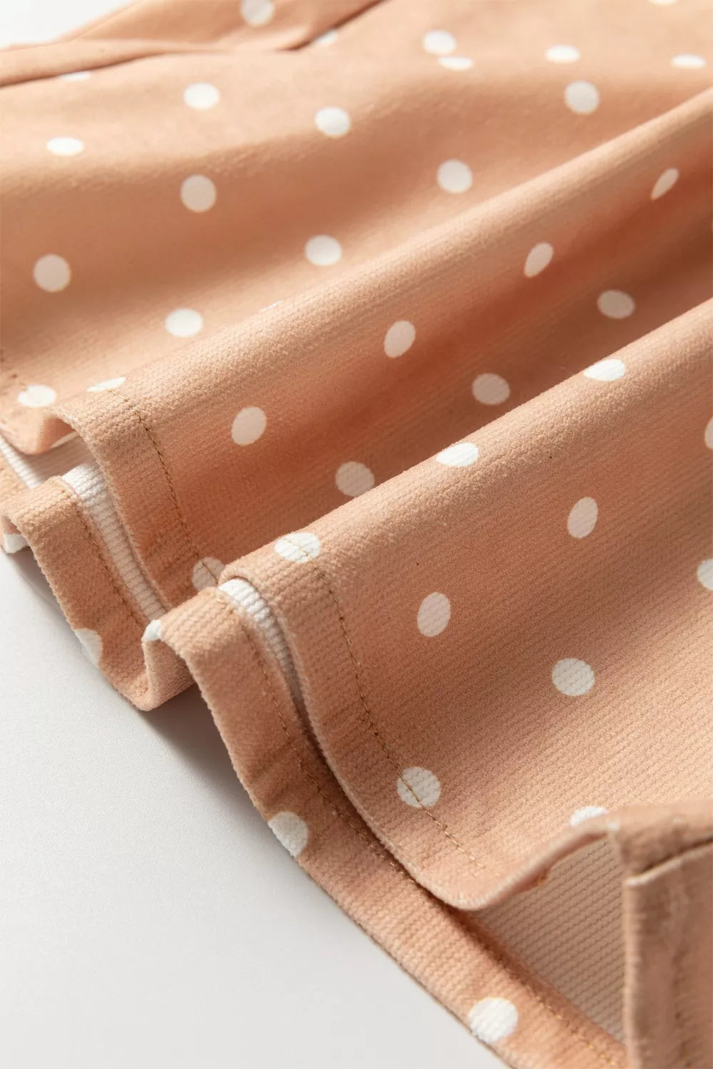 Women’s lightweight polka dot wide-leg casual trousers with drawstring waist, by Plush Fashion Hub, shown in a relaxed dress style.