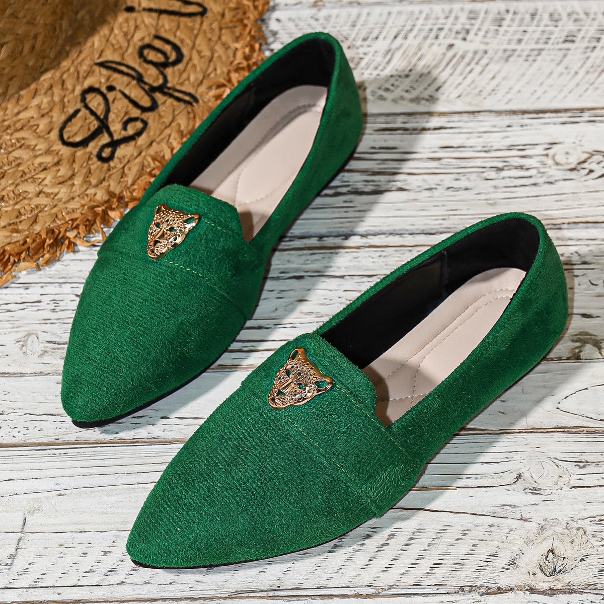 Point toe slip-on footwear by Trendsi featuring sleek design and comfortable fit, perfect for stylish everyday wear.