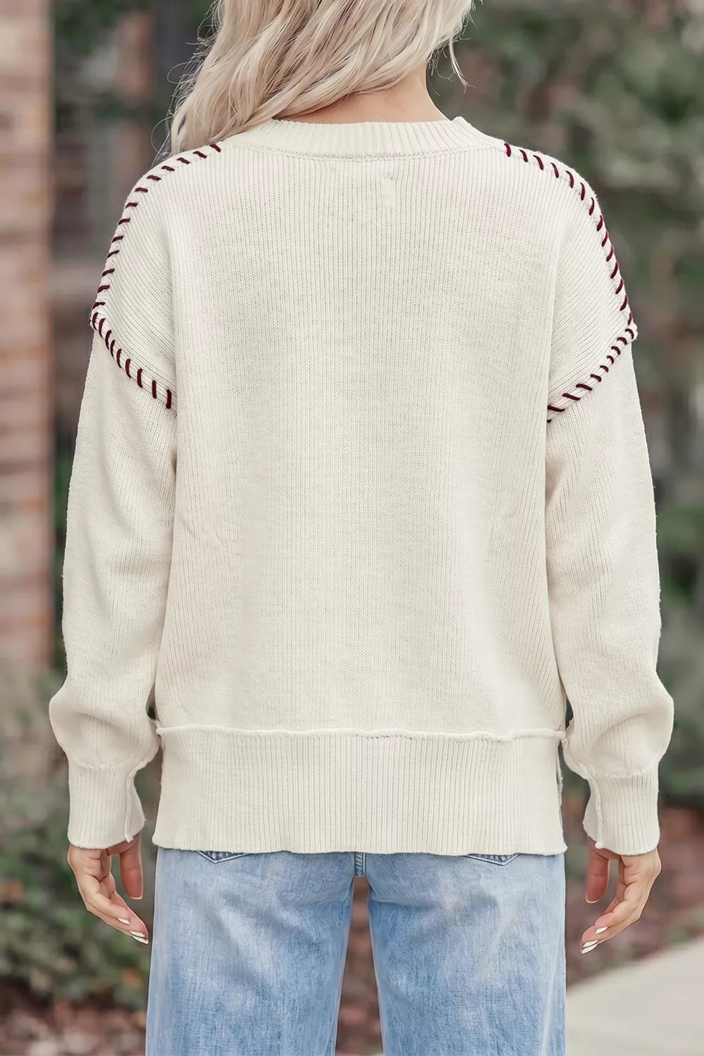 Trendsi drop shoulder game day letter sweater featuring a cozy knit design with bold letter graphics on the front.