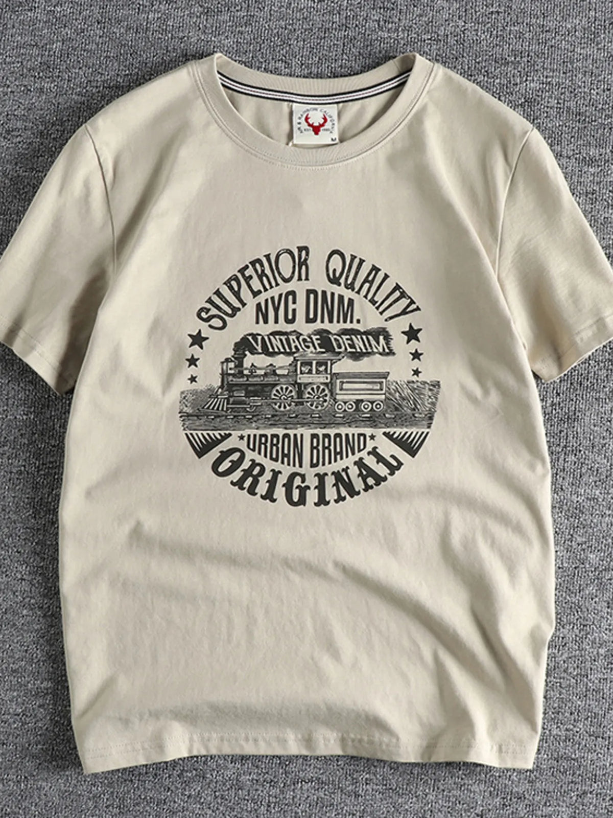 Men's plus size graphic round neck short sleeve T-shirt from Trendsi, featuring a bold design on soft fabric.