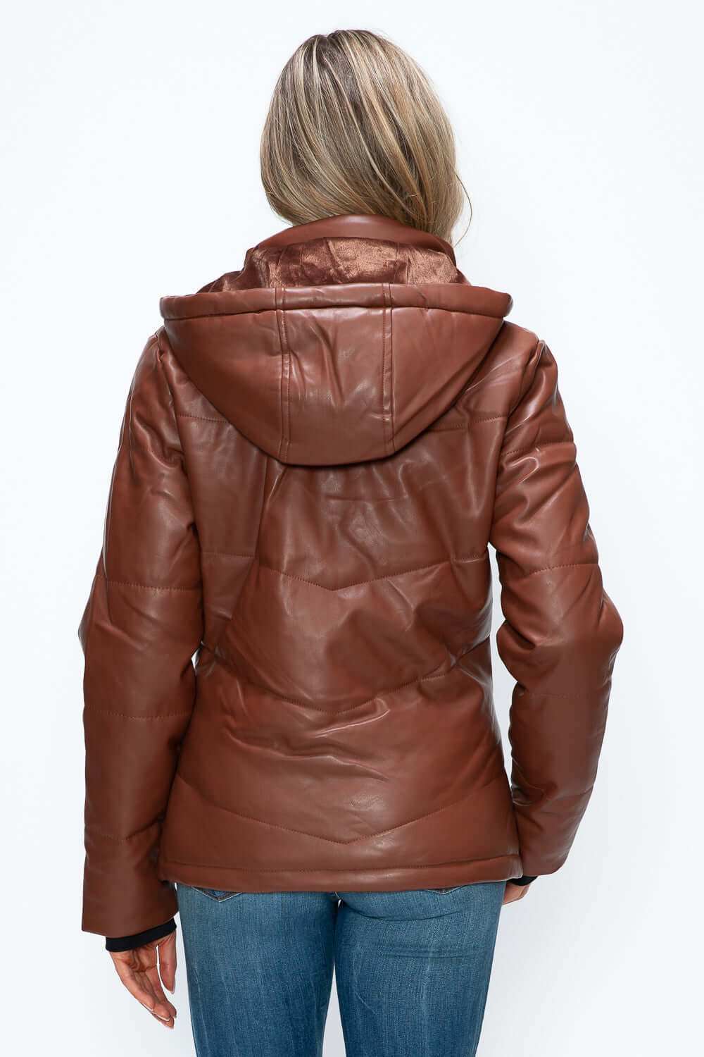 Pocketed zip up puffer jacket with removable hood in pleather.