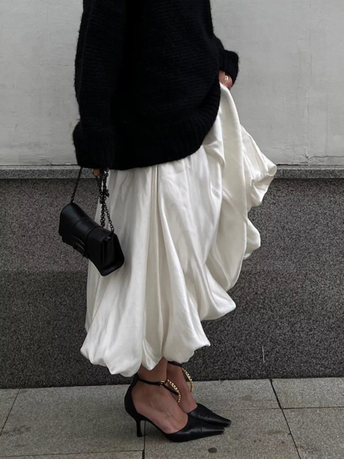 Plush Fashion Hub flowy satin maxi skirt in elegant design, showcasing smooth fabric and full-length style.