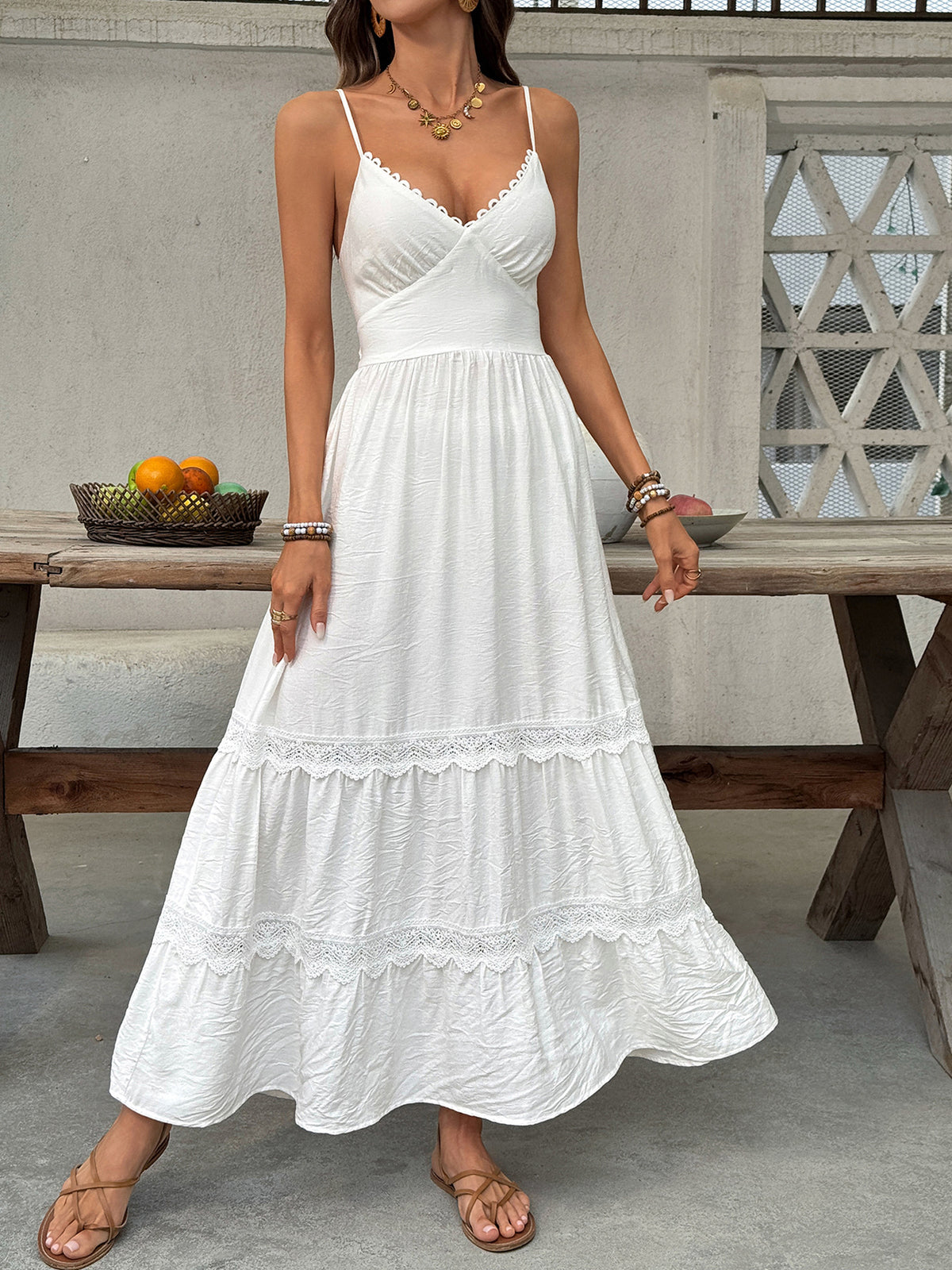 Women’s V-neck tiered maxi dress with delicate lace detail, stylish and flowy dress by Plush Fashion Hub.