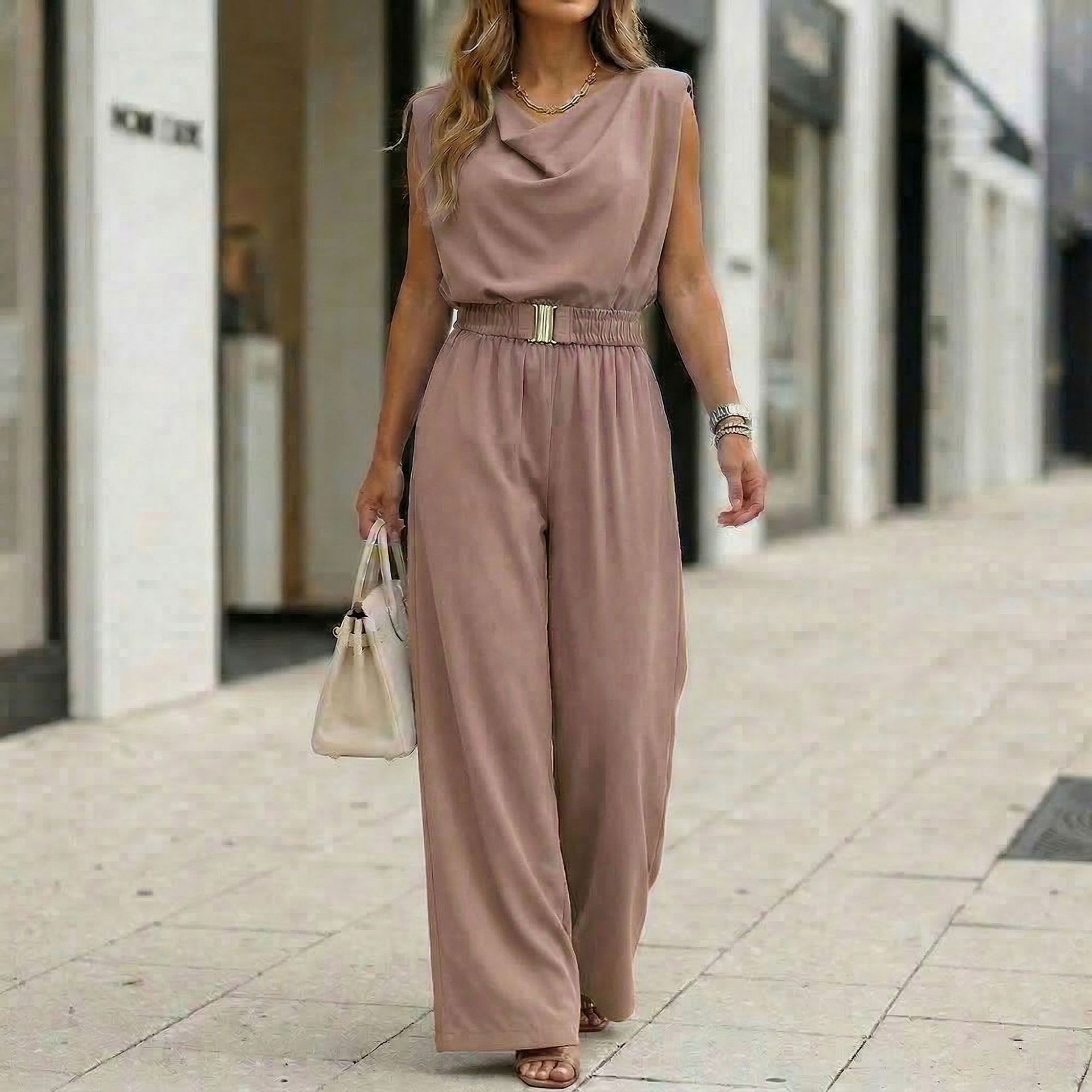 Women's off-shoulder sleeveless wide-leg jumpsuit with high waist and belt, casualwear by FitiqueFit, shown on a model.