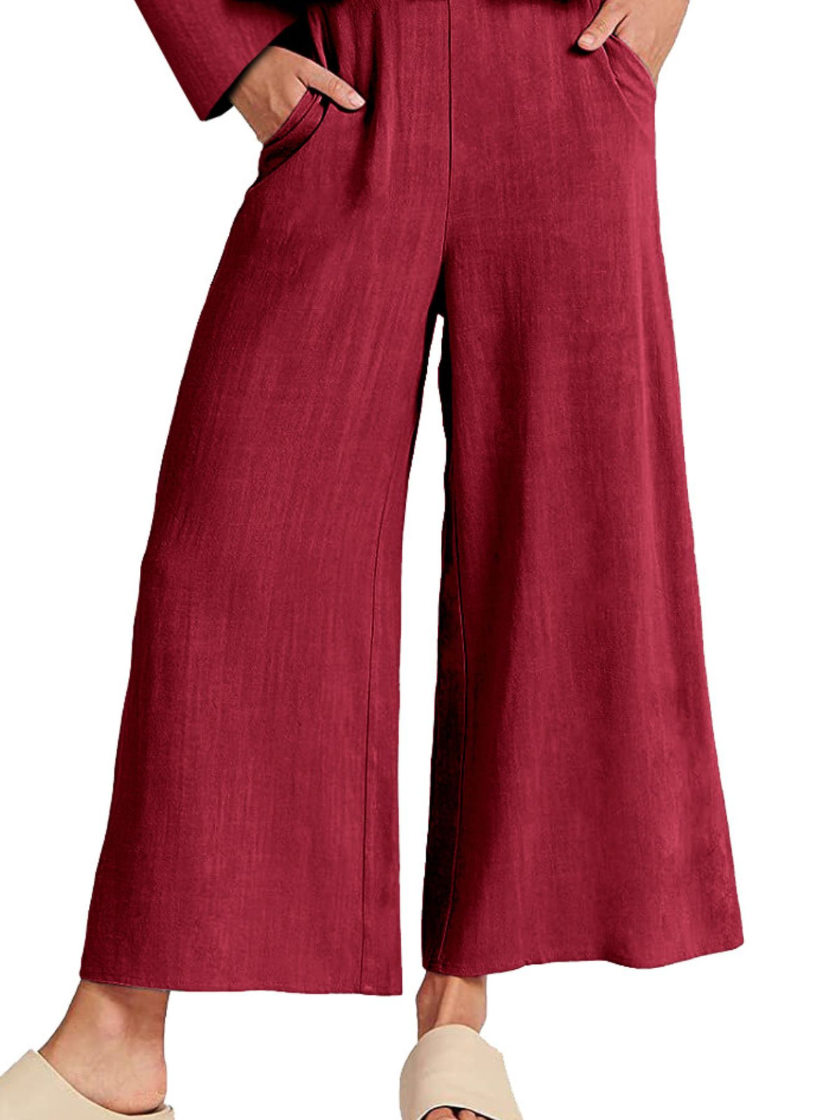 Women's long sleeve ruffled hem top and pants lounge set with pockets by Plush Fashion Hub, shown with soft fabric and relaxed fit.