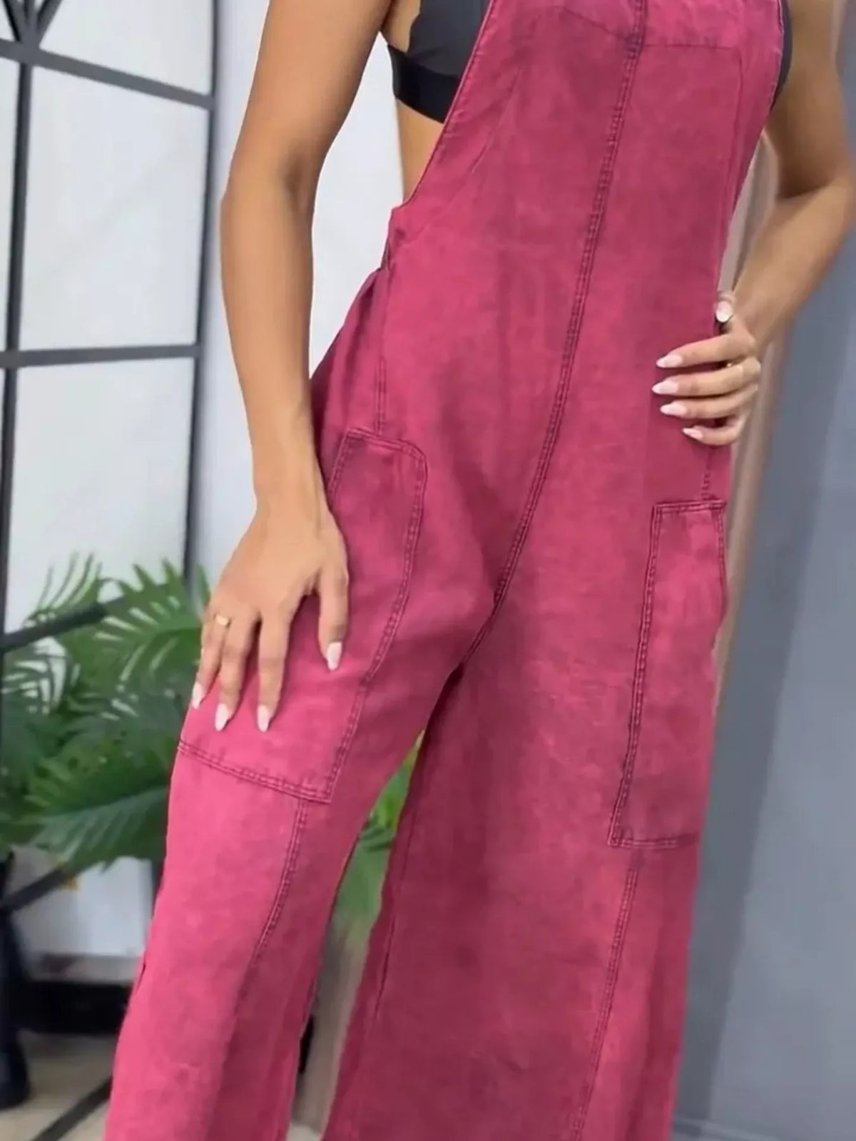 Blue wide leg denim overalls in a full-size one-piece style by Plush Fashion Hub, featuring adjustable shoulder straps and front pockets.