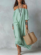 Women's striped loose-fit flared maxi dress by FitiqueFit, featuring a relaxed fit and bold horizontal stripe pattern.