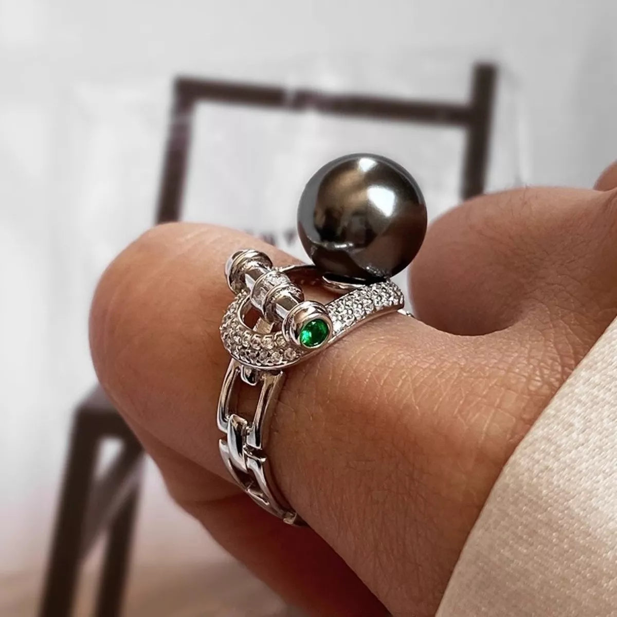 Sterling silver zircon pearl ring with intricate design, featuring a shiny pearl and sparkling zircon stones, perfect for elegant jewelry.